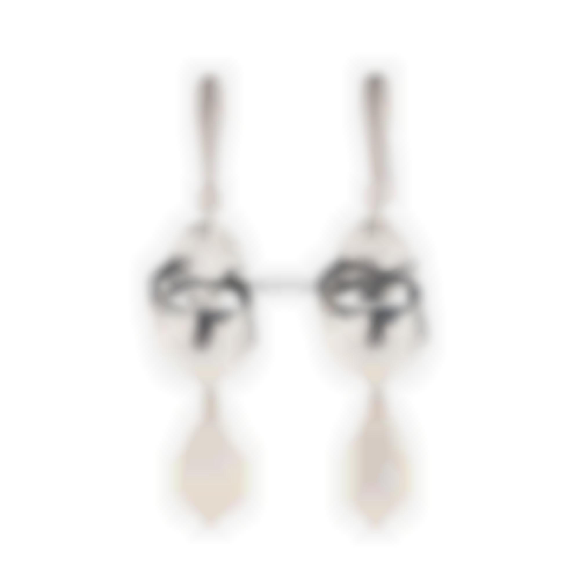 Earrings set in silver with natural fresh water pearls 