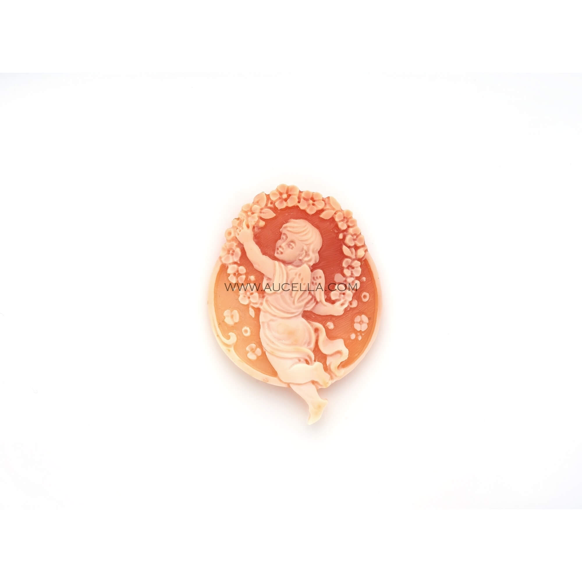 Dancing children carved on natural seashell cameo