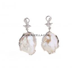 Earrings set in silver with pearls and zircons