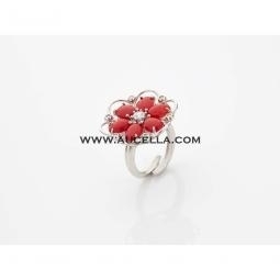 Flower ring set in silver and coral 