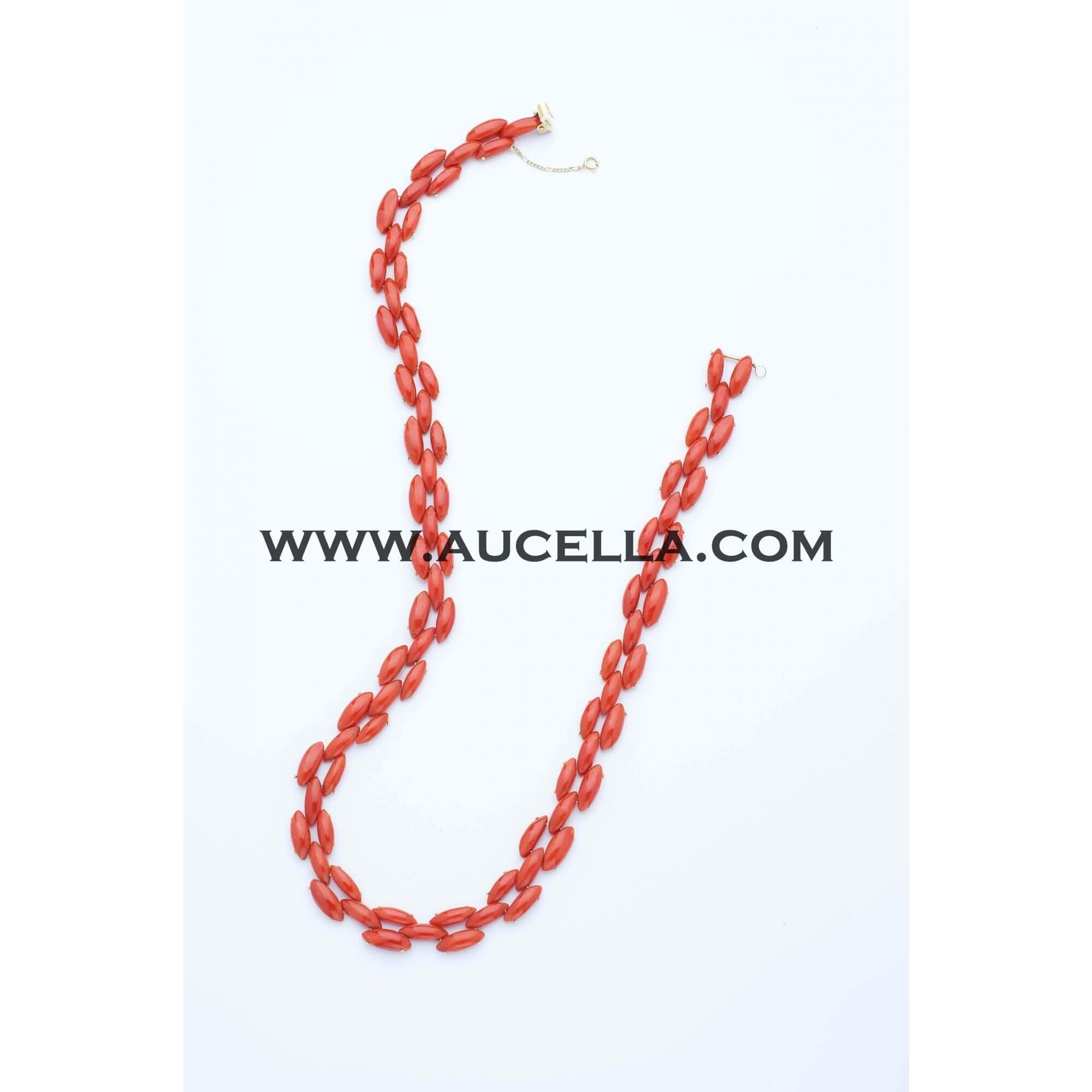 Natural red coral necklace set in gold 