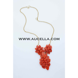 Necklace with natural red coral flowers set in gold 