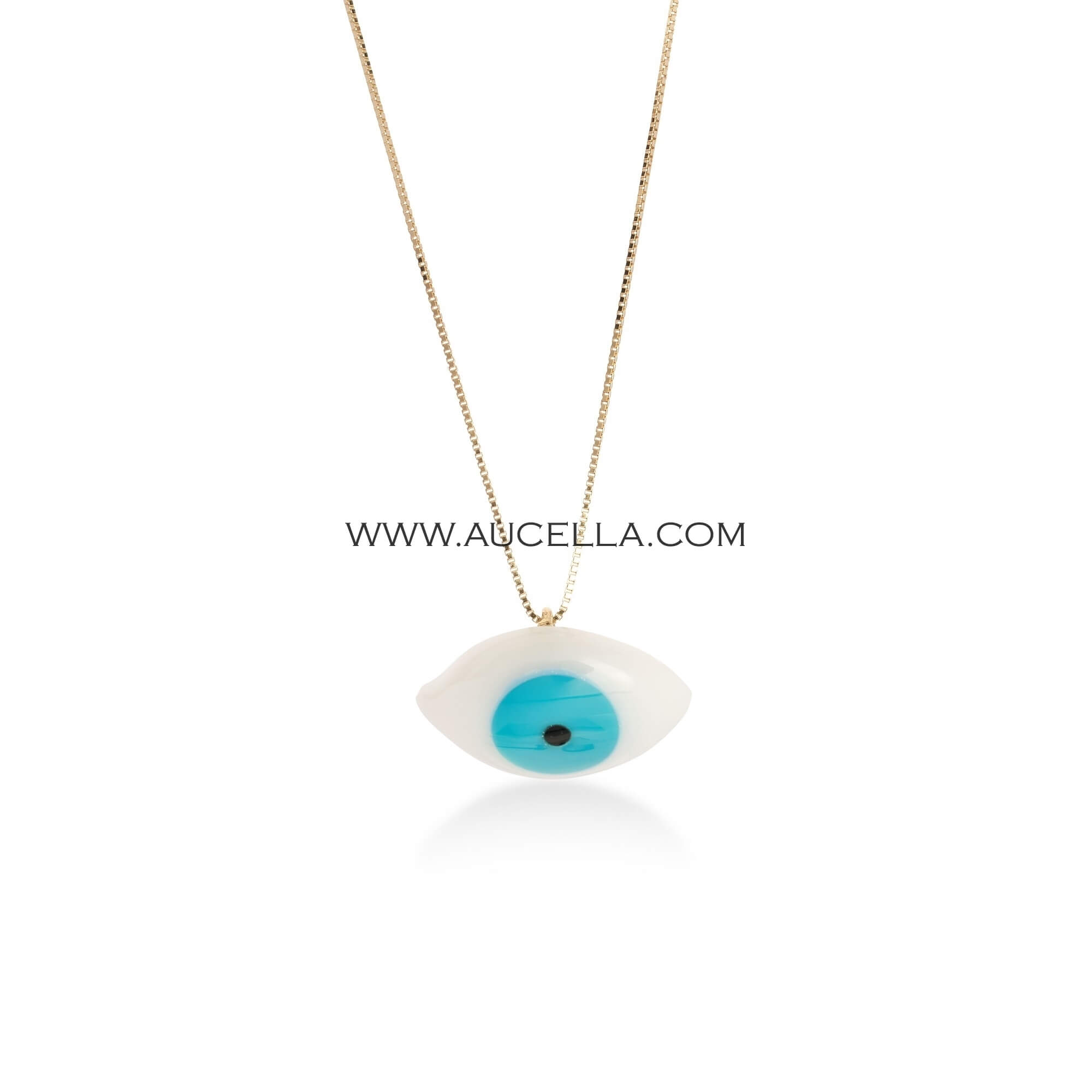 Natural turquoise set in gold eye shape 