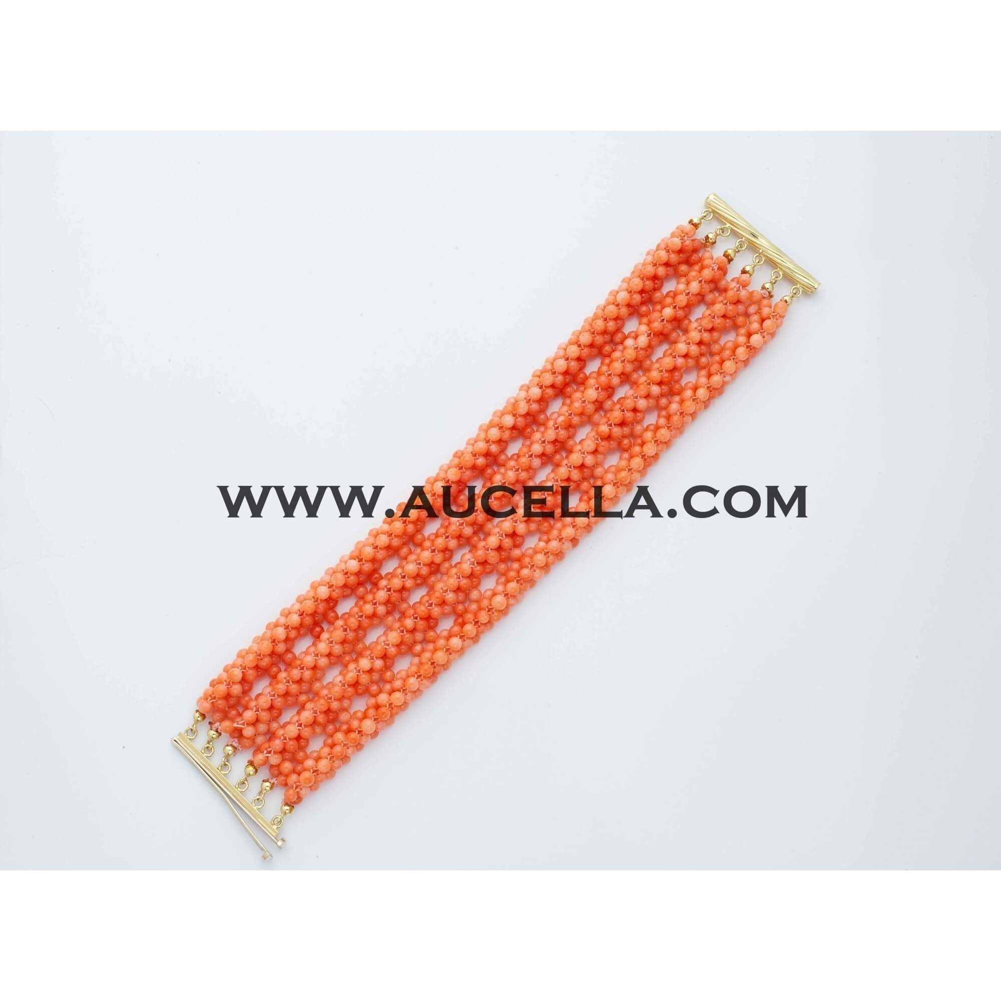 Bracciale in oro giallo con corallo rosso naturale 