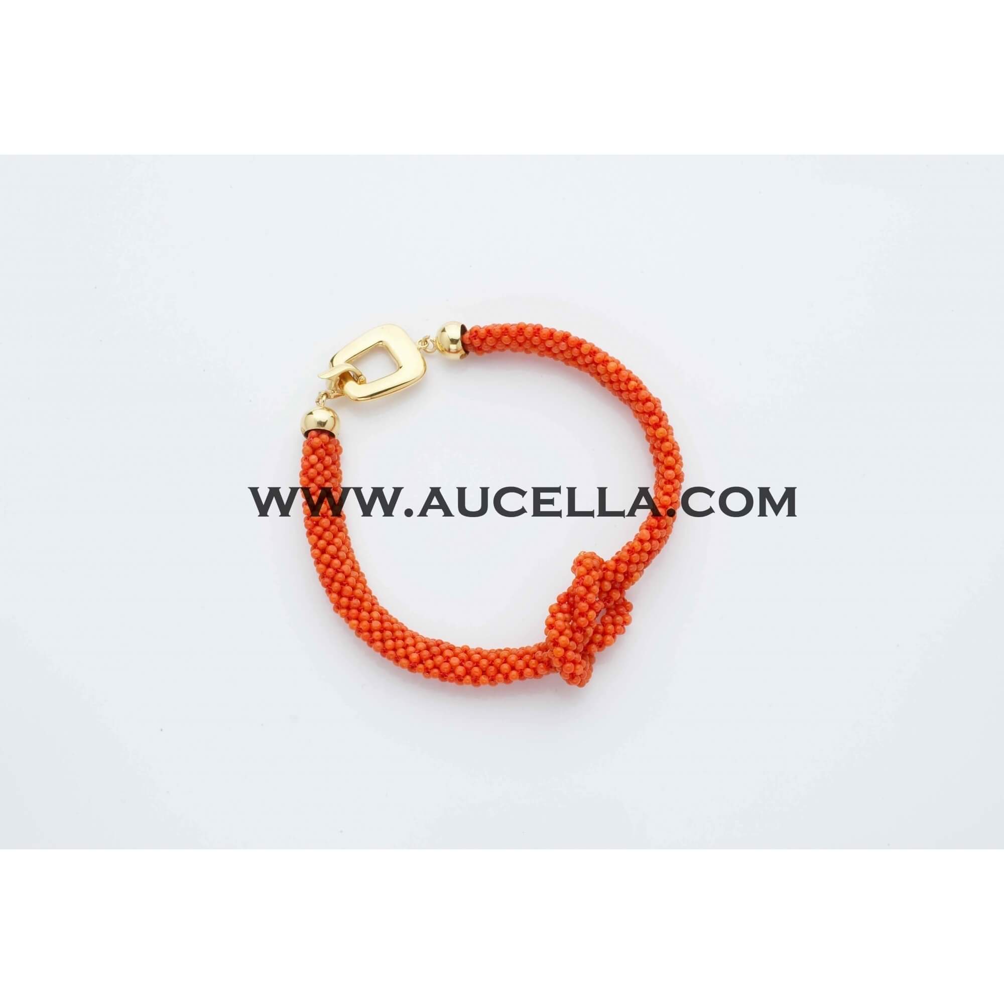 Bracelet set in gold with natural coral beads