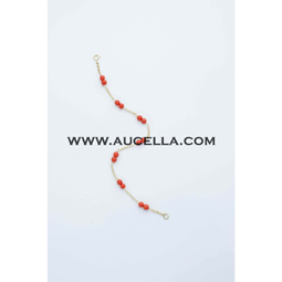 Bracelet with natural red coral beads set in gold 