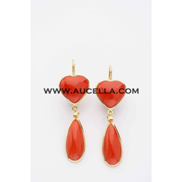 Earrings set in gold with red coral hearts