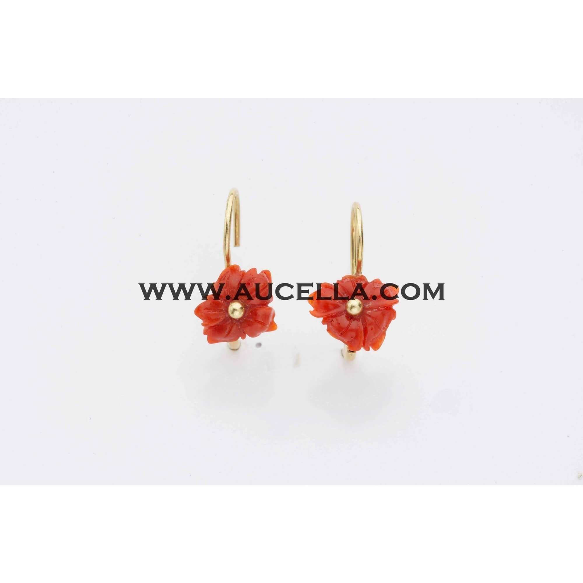 Coral flowers set in gold 