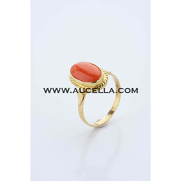 Ring set in gold with red cabochon 