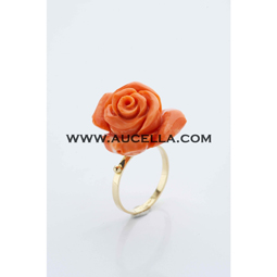 Ring set in gold with coral rose