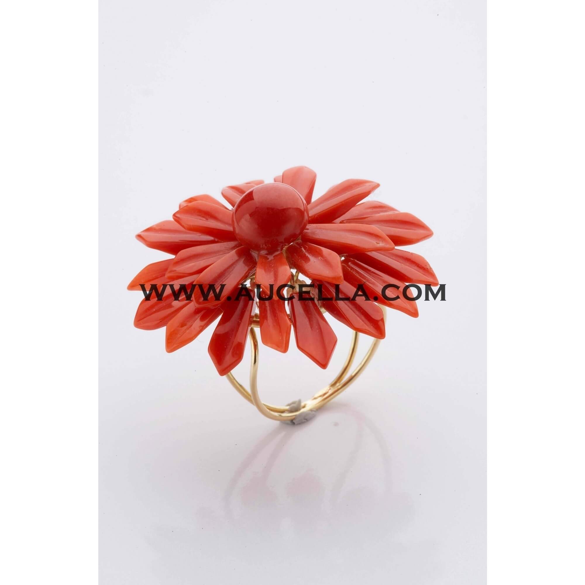 Ring set in gold with coral flower