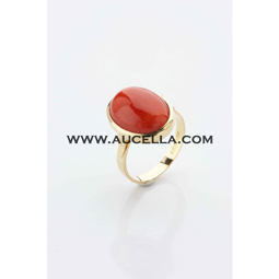 Ring set in gold with natural red cabochon