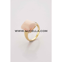 Ring set in gold with natural coral square cabochon