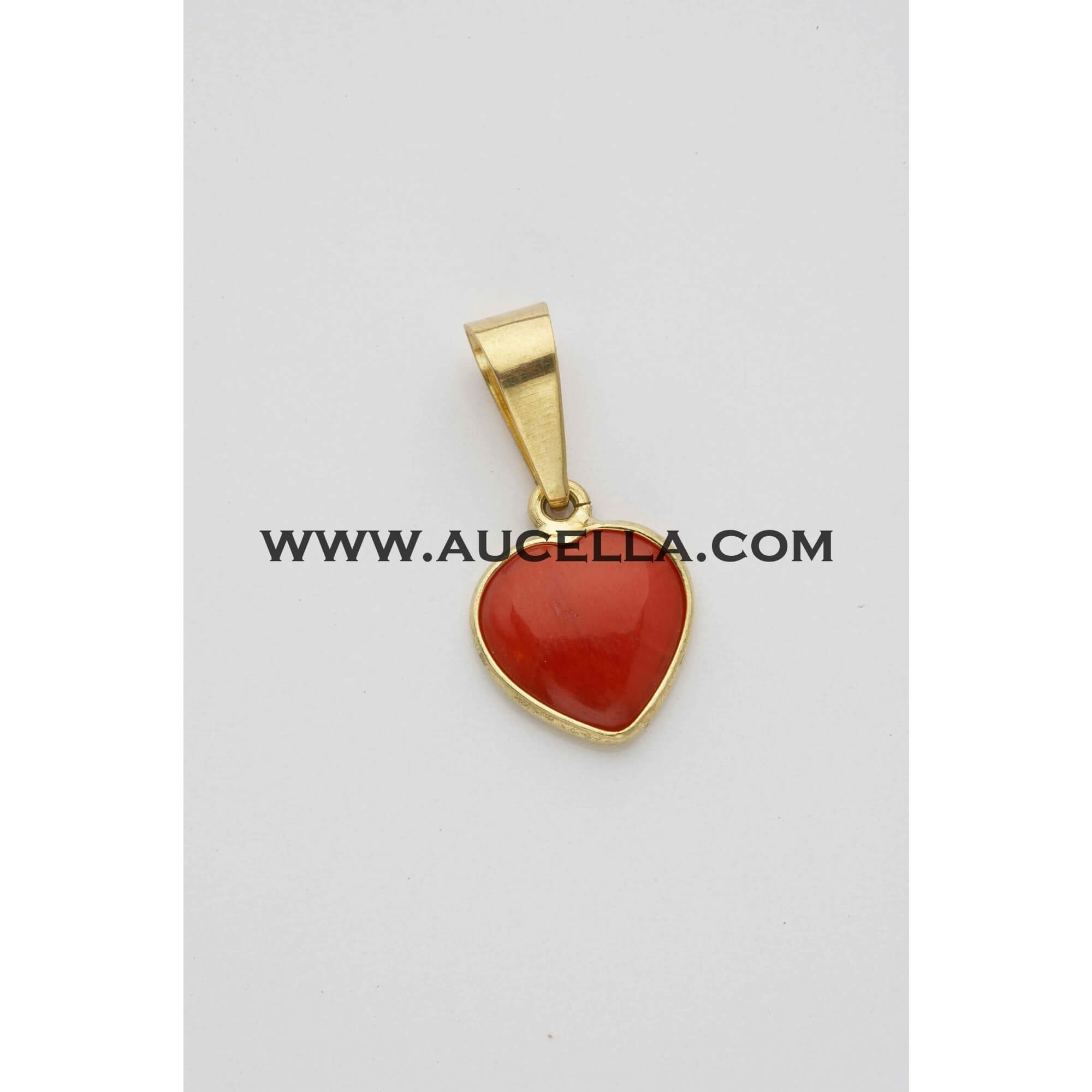 Pendant coral heart set in gold 