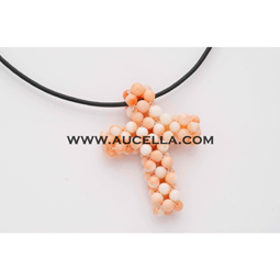 Pendant cross with natural pink coral