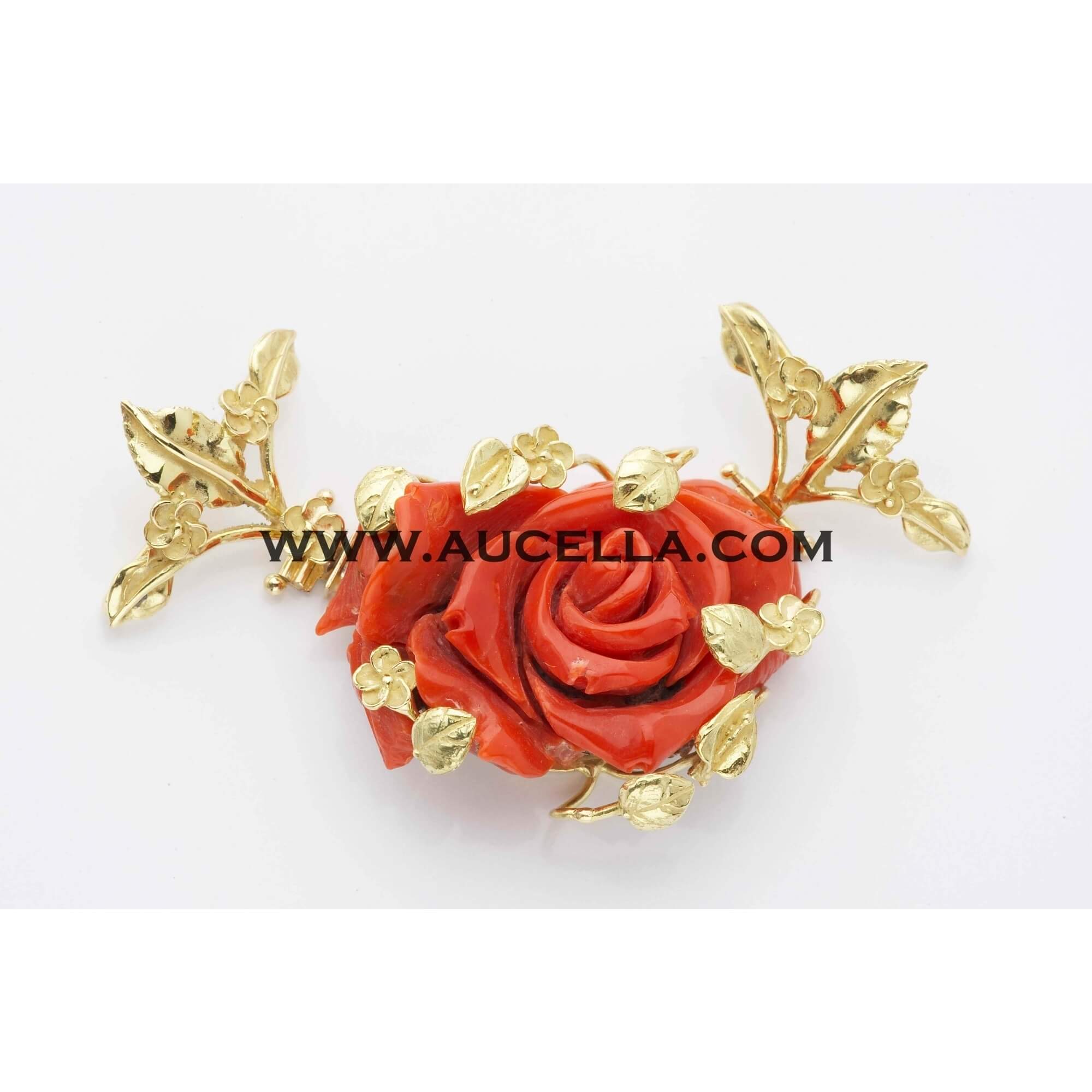 Clasp set in gold with natural red coral rose