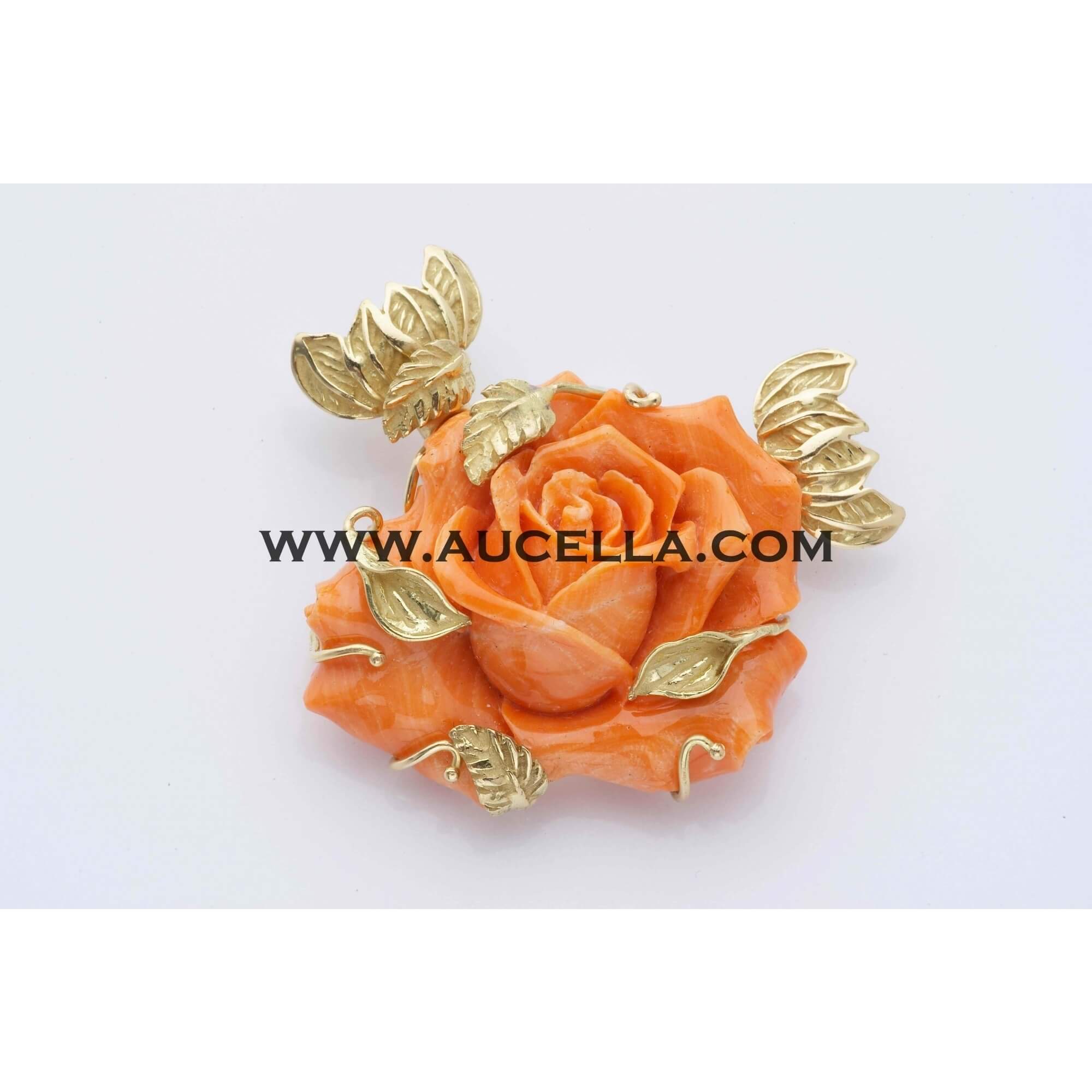 Clasp set in gold with natural coral pink rose 