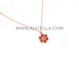 Luxury model pendant set in gold with coral 